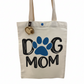 Tote bag with 'Dog Mom' text and paw print design on a white background