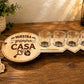"Nuestra Primera Casa" key-shaped wood shot glass holder, the Spanish design, with four glass shot cups and a house tag