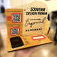 Side view of the Souvenir Design payment display, with layered wood, a frosted acrylic arch, QR codes and a card reader set in its slot
