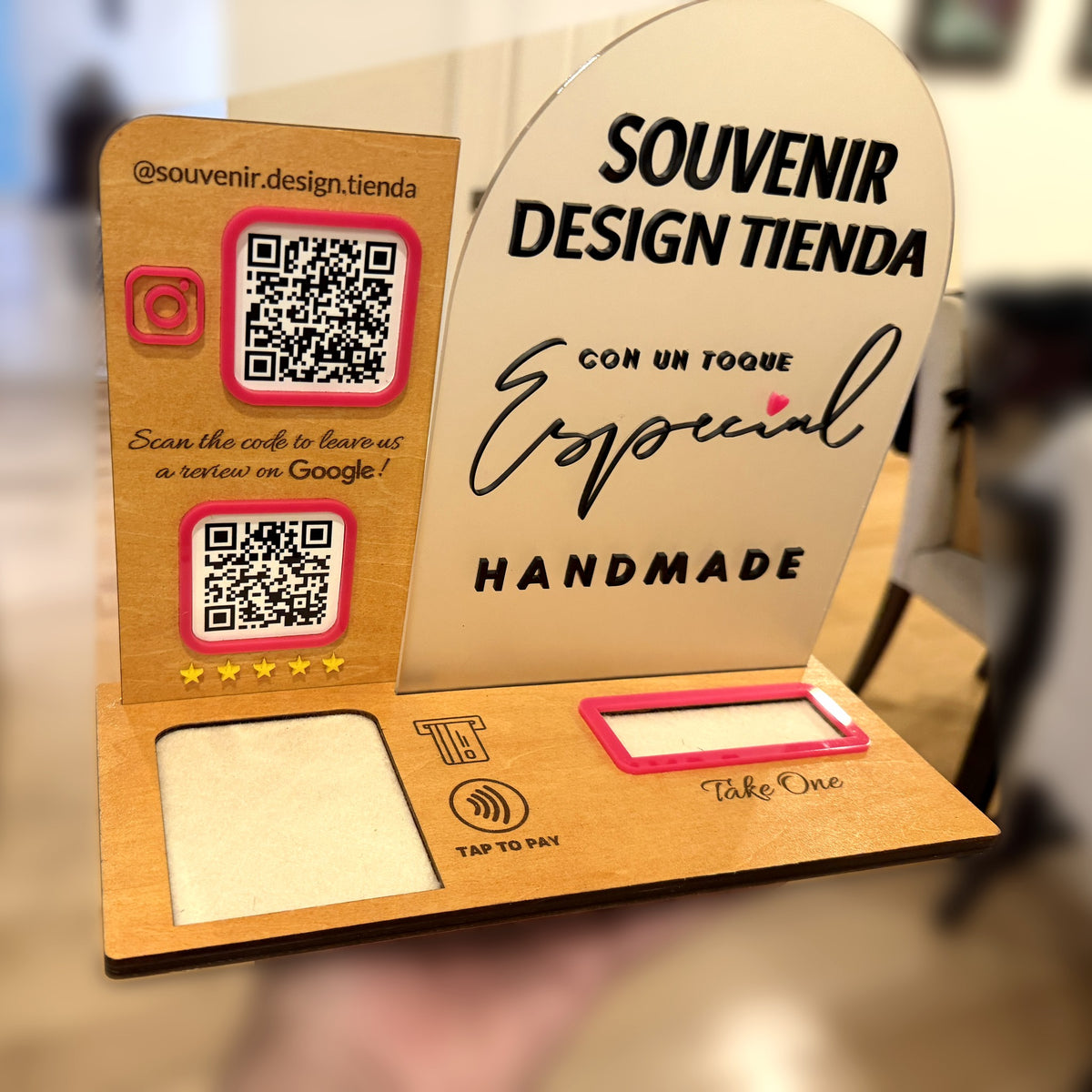 Souvenir Design payment display without the card reader, showing the felt-lined slot for your own reader, the Tap to Pay icon and the Take One card holder