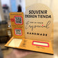 Front view of the Souvenir Design payment display with the empty reader slot, the Instagram and Google review QR codes and the acrylic sign
