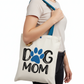 Rendering of a person holding a tote bag with 'Dog Mom' text and paw print design.