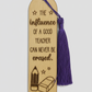 Wooden bookmark with purple tassel and engraved text on a white background